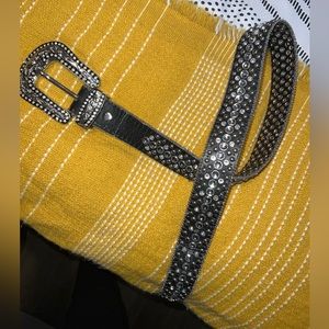 Very pretty, gently used, black belt covered in rim-stones